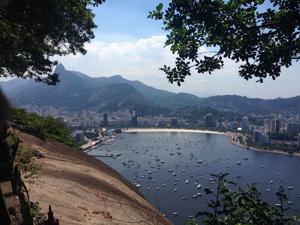 a beach with a city in the background