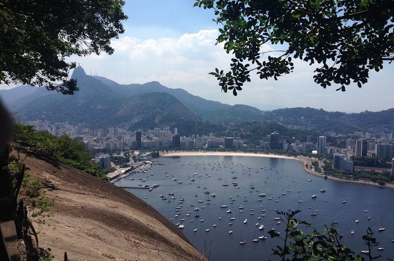 a beach with a city in the background