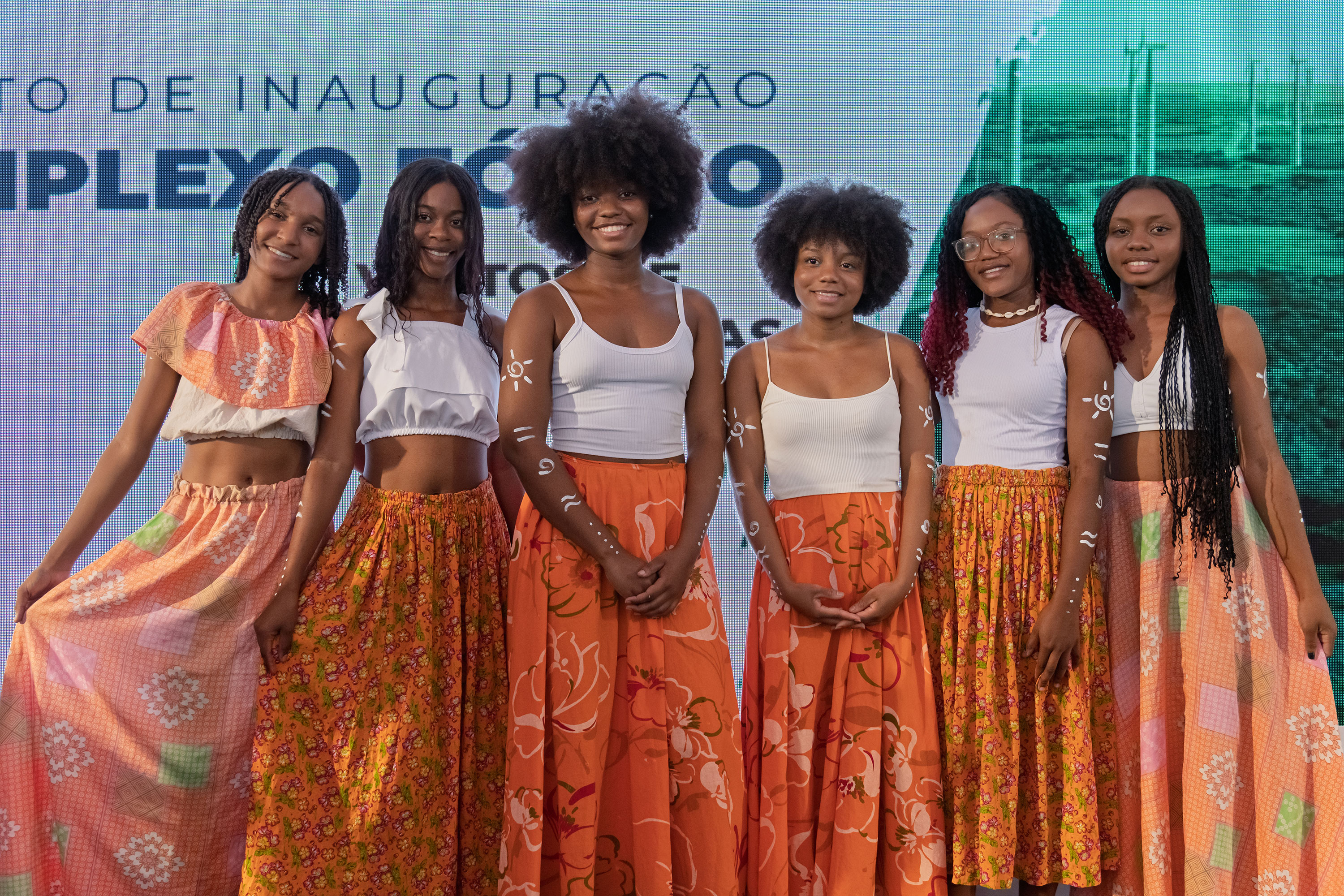 a group of women posing for a photo