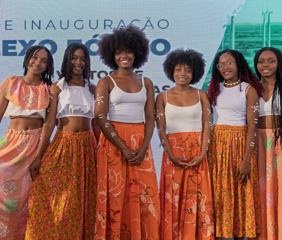 a group of women posing for a photo