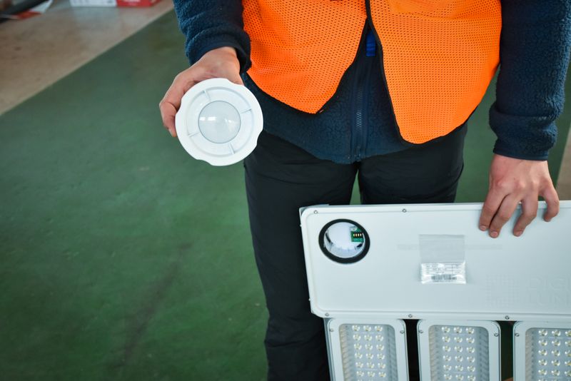 a person holding a white disc