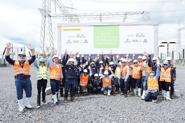 a group of people posing for a photo