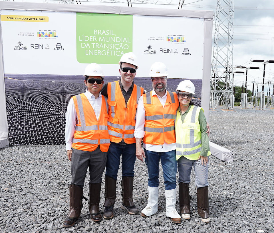 a group of people wearing safety vests