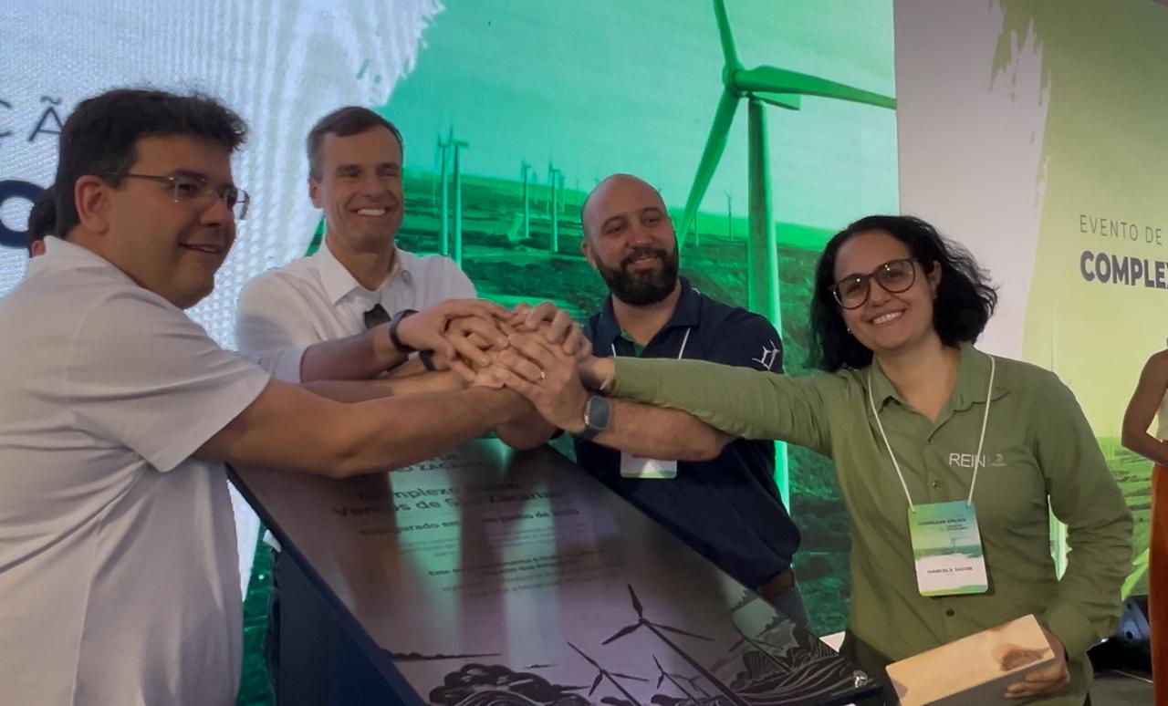 a group of people sitting at a table