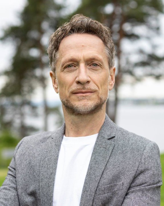 a man in a grey suit