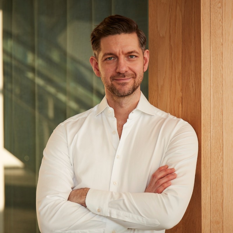 a man folding his arms