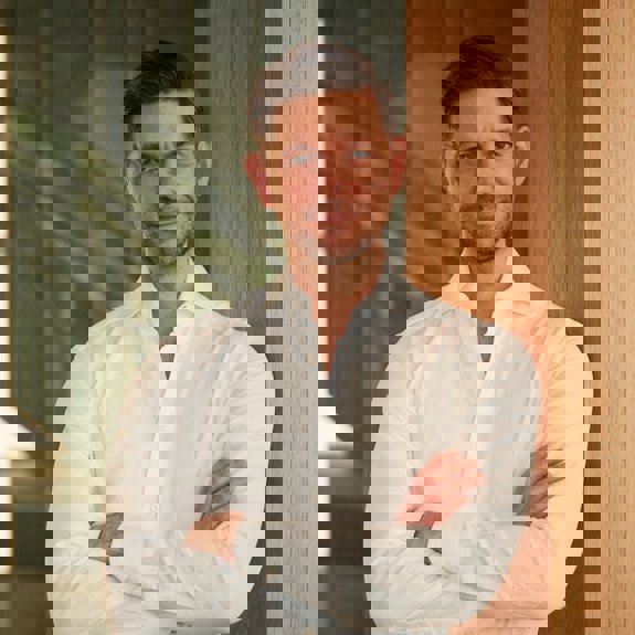 a man folding his arms